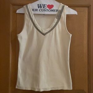 Sleeveless top with button embellishments